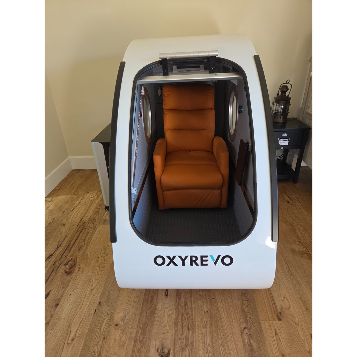 Pre-Owned OXYREVO Space60 2.0 ATA Hard Sitting Hyperbaric Chamber — Only 42 Hours Used, IN STOCK (White Exterior, Orange Chair)