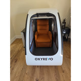 Pre-Owned OXYREVO Space60 2.0 ATA Hard Sitting Hyperbaric Chamber — Only 42 Hours Used, IN STOCK (White Exterior, Orange Chair)